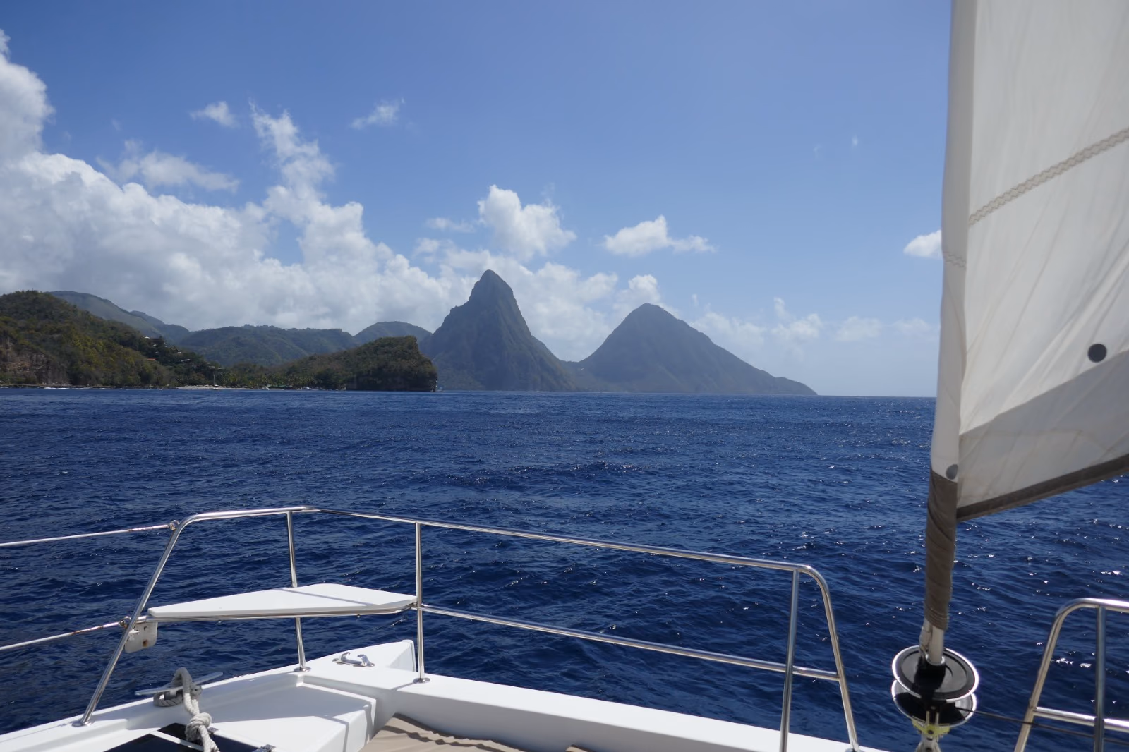 The Pitons of St Lucia seen from the deck of a sailing yacht